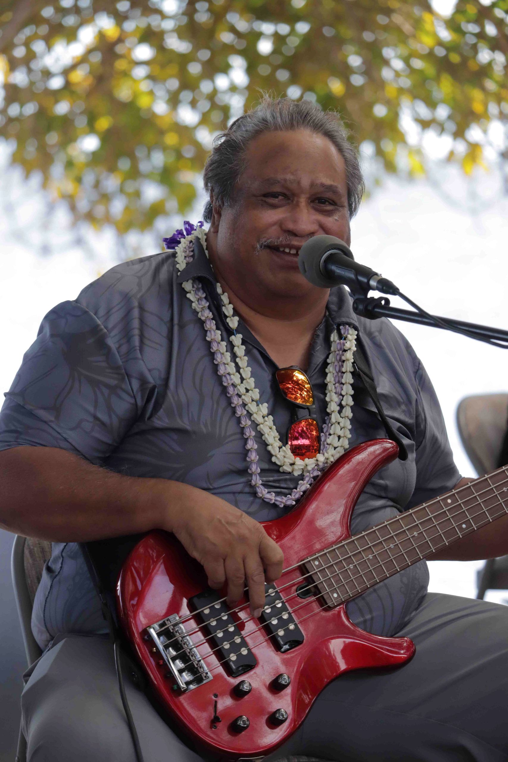 A local musician performs at the Hoʻolauleʻa